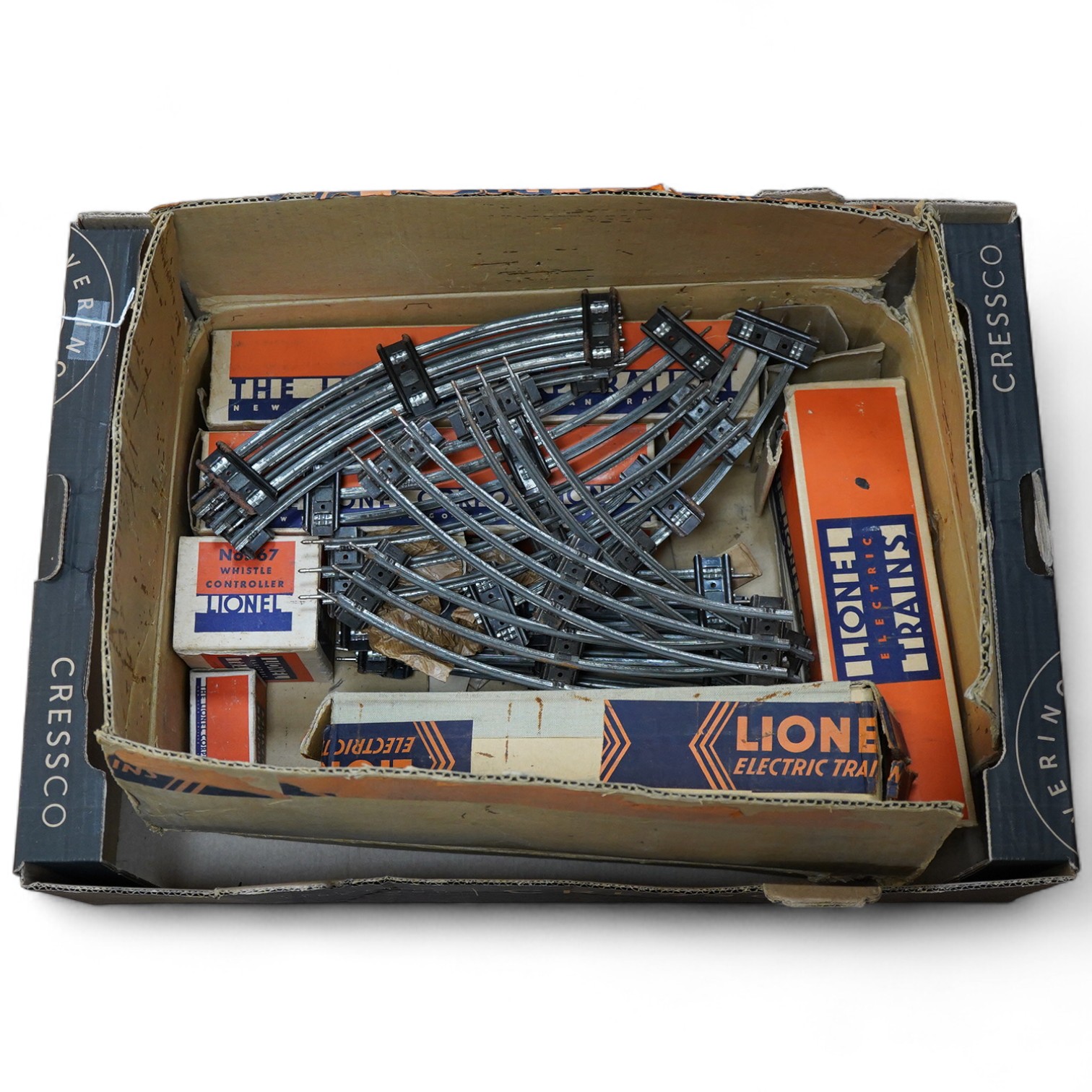A boxed Lionel 0 gauge ‘Flying Yankee’ train set, comprising of a streamlined articulated diesel locomotive No.616, and three articulated chrome bogie cars; two No.617 and an observation car No.618, together with a boxed